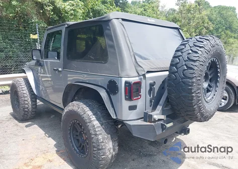 2013 Jeep Wrangler Sport z USA, uszkodzony, nr VIN 1C4AJWAG2DL648315